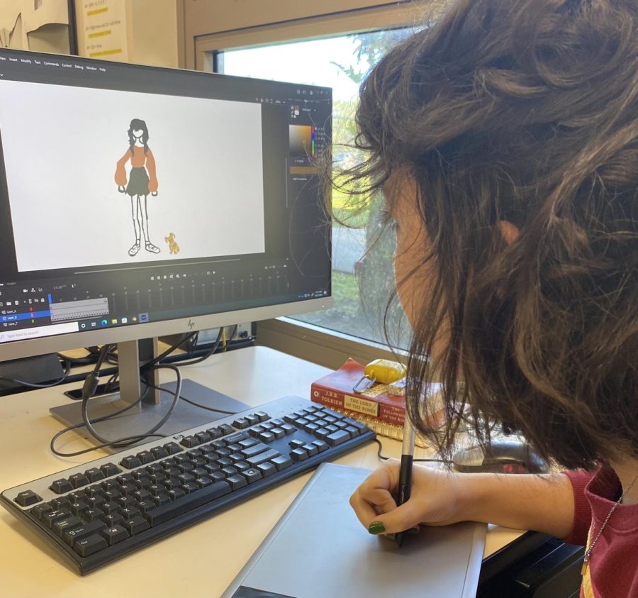 Senior Hailey Andrews is putting her artwork of her friend and dog onto a new program. She is going to turn her drawing into an animation in Digital Art two, which is one of the performing arts classes in Steinbrenner. Photo Courtesy of Lisa Donat.