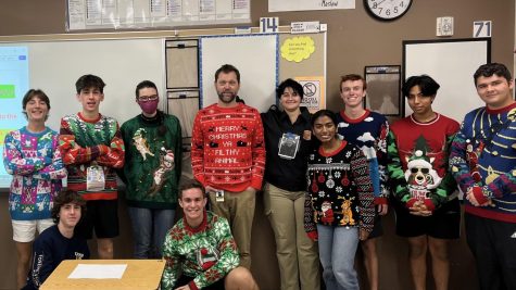 AP Calculus students participate in ugly sweater day to show off how they celebrate for the holiday season. This also reflected different holidays people observe with sweaters representing Christmas and Hannukah. Photo courtesy of Prahas Kandukuri. 