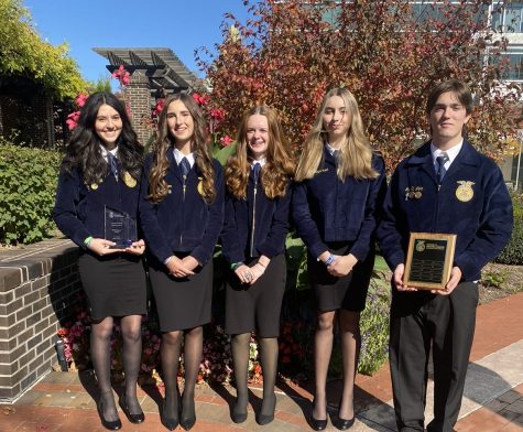 Steinbrenner Sophomores Ava Gelyon, Ian St. John, Lilly Mccormack, and Juniors Jillian Towe, Renata Blatt compete at the FFA nationals. At the convention Steinbrenner was awarded a trophy for winning 3rd place for their presentation and a plaque for being a 3-star chapter. Photo courtesy of Jessica Switzer. 