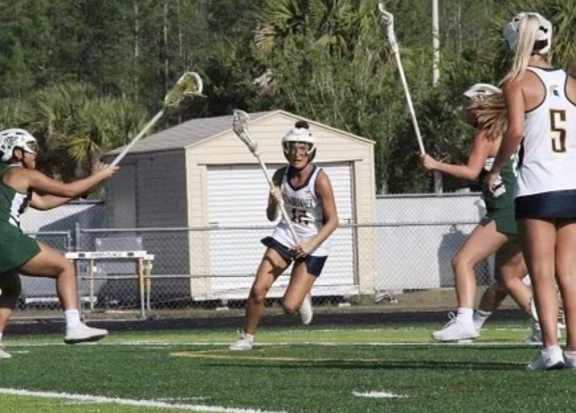 Senior Rori Prilik sprints down the field in a tough game of the season. Prilik, along with two other Steinbrenner athletes, was recently named ‘All-American’ in Lacrosse. Photo Courtesy of Rori Prilik. 