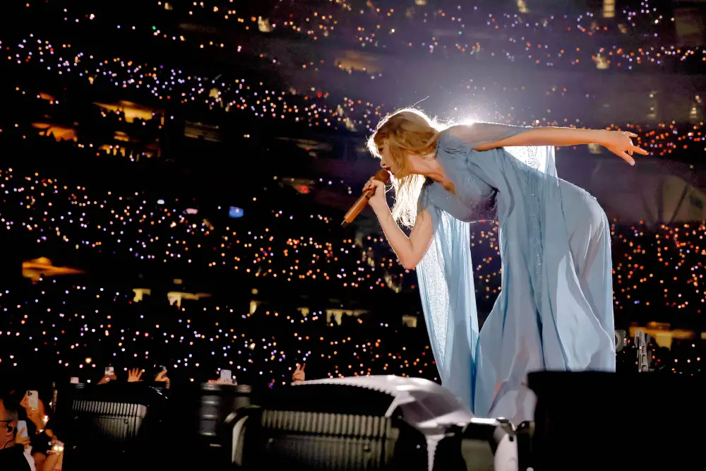 Taylor Swifts, never seen before, blue Folklore era dress. Photo courtesy of Insider.