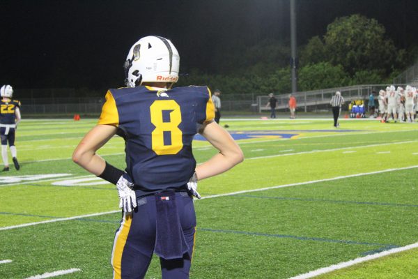 Receiver Brenan Lowe looks onto the field as the season begins. Soon to be a record holder for Steinbrenner football. Photo courtesy of Maria Nicklow. 