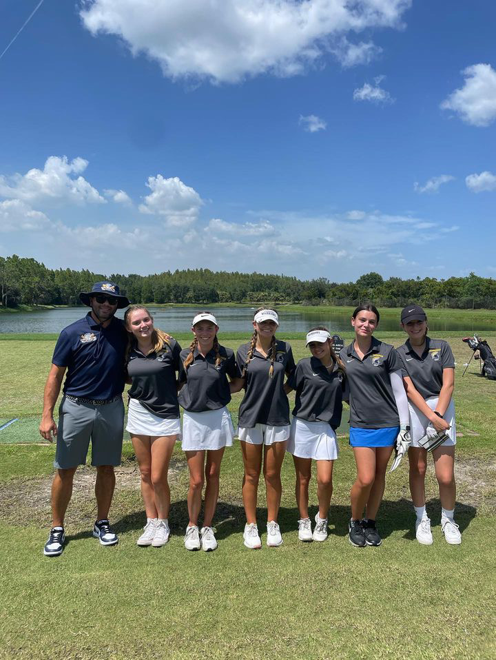 The Lady Warriors join together before a round of golf. They would have continued success at their meets. Photo  courtesy of Josh Goldstein. 