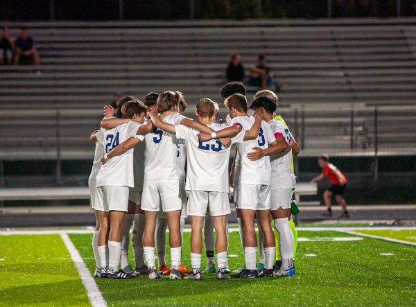 The Warriors gather together as a team before a win. They have come closer together as the season has moved along. Photo courtesy of Nicholas DeCastro
