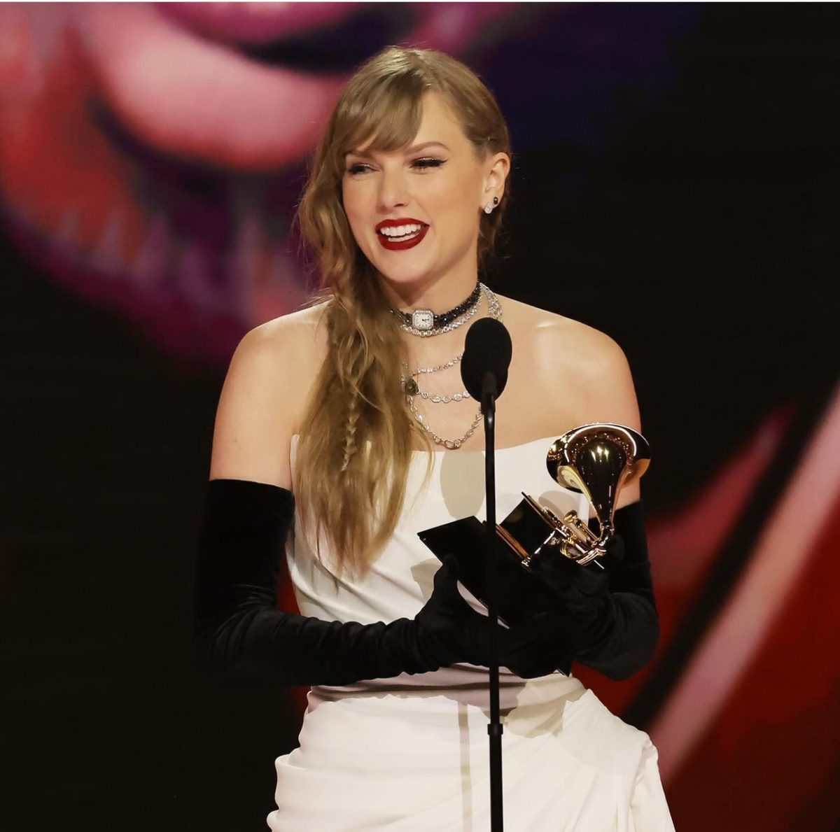Taylor Swift accepting her award for Best Pop Vocal. Right after this, she announced her newest album which will be out April 19th. Photo courtesy of @tstourtips. 
