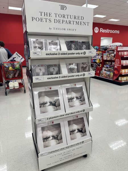 The Tortured Poets Department stand in Target containing different variations of vinyls and CDs. One variation, the phantom clear vinyl, is only available for purchase at Target. Photo courtesy of Alyssa Galang.  