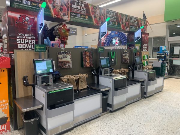 Self-checkout machines at Publix Super Market at Northgate Square. Self-checkout has evolved from a convenience to a challenge to the disabled. Photo courtesy of Weather Riley. 