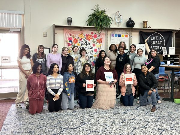 The Poetry Jam participants with guest poet Sam Obeid after the top three winners were announced. Each winner received a gift card as a prize for their outstanding performance of their own poetry. Photo courtesy of Alyssa Galang. 