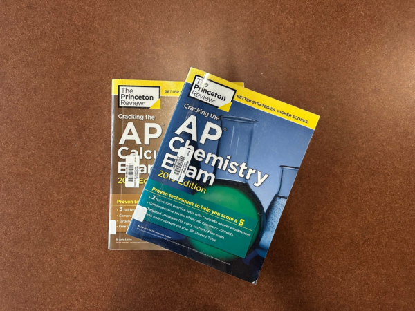 An AP Chemistry and Calculus book from the library. Checking out books from the library is a great resource to make sure you ace your AP exam! Photo Courtesy of Madden Creamer. 