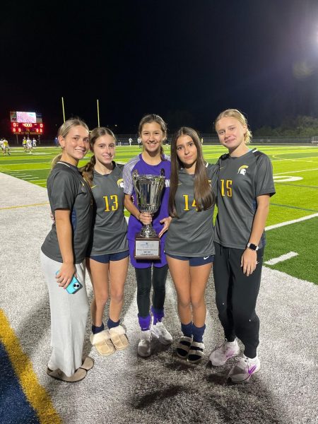 The Steinbrenner Warriors pose with their district champion trophy. After winning a huge district game. Photo courtesy of Coach Aitken. 