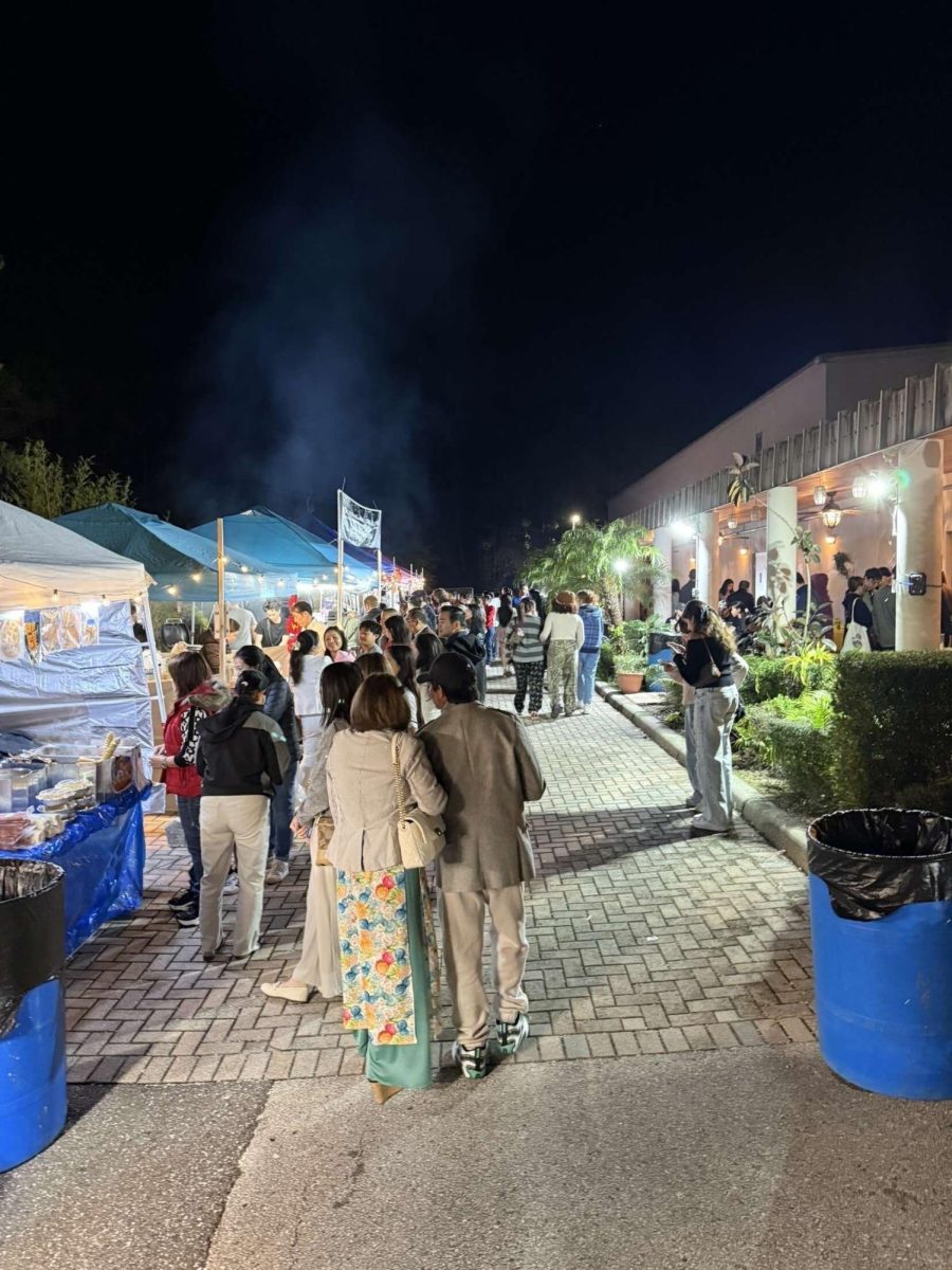 People walking to different tents that are set up selling food and gifts. Festivals are hosted every year to celebrate the culture and spread positivity for the new year. Photo courtesy of Shiv Kewalramani.  