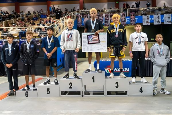 Alzider ‘Slider’ Ortiz during the award ceremony after placing 5th in 106lb at the State Tournament. He along with three others had qualified to compete at States just a week before. Photo courtesy of Alzider Ortiz.