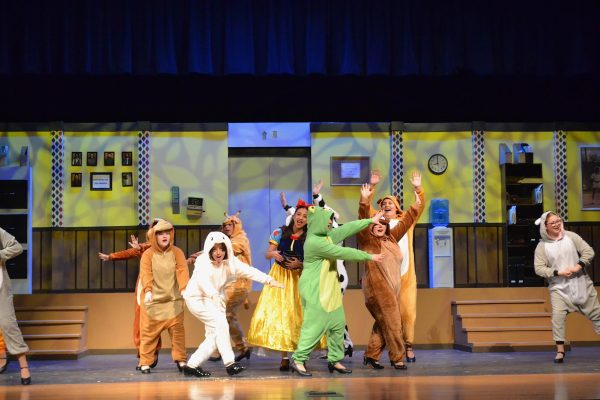 Steinbrenner's theatre program performing their spring musical 9 to 5 where Alanna Aquino Vassallo, who plays Violet Newstead, is dressed as Snow White and stands in the middle of a circle around her animal friends during her song “Potion Notion." Many weeks of hard work went into preparing for this production and the cast finished out the year with a successful show. Photo courtesy of Jayleigh Inman.