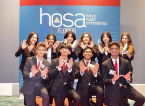 Steinbrenner's HOSA group poses outside of the official HOSA building where awards were granted to a few students to honor their dedication.  In previous years, HOSA used to be a much smaller organization until multiple schools began participating to give students an opportunity to pursue their passion. Photo curtesy Mrs. Wantuch. 