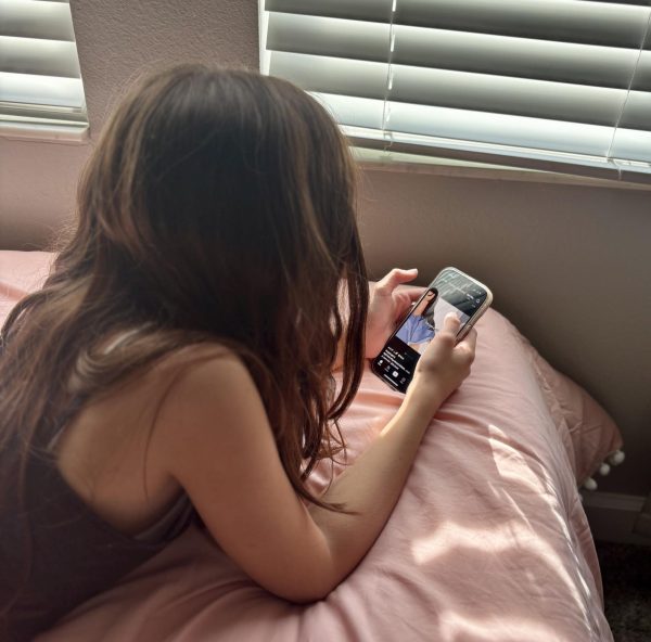 Milena Vydas scrolling on TikTok. Teenagers now have been spending most of their time on social media. Photo courtesy of Sophie Vydas 