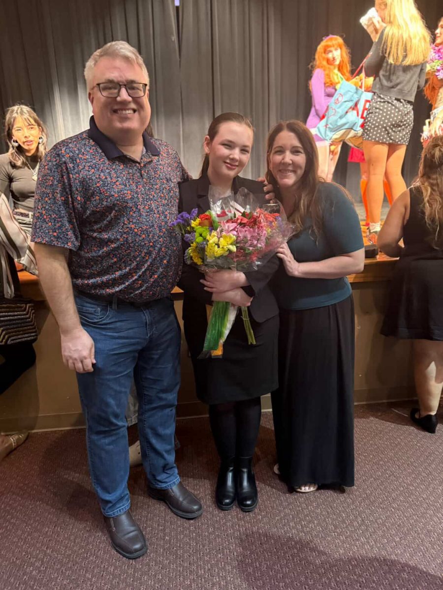 Mallory Dayton, a junior at Steinbrenner High School, celebrates with her proud parents after her one-act play, The Audition, captivated audiences on September 30th. Her performance showcased the passion, creativity, and dedication of Steinbrenner’s talented theatre students. Photo courtesy of Steinbrenner Theatre .