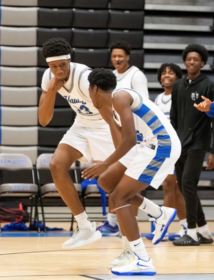 Steinbrenner basketball players playing against Armwood. The Warriors lost this match against the Hawks.
