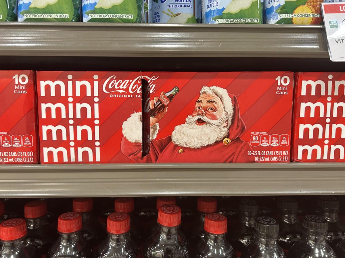 A package of soda with a photo of Santa Claus. Companies like Coca-Cola often use Santa Claus during the winter months to promote sales. Photo courtesy of Jaime Vergara