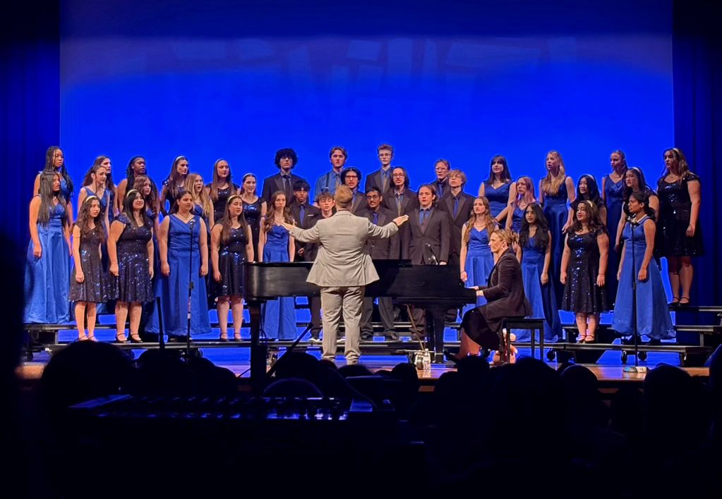 Mr. Dyle directs Steinbrenner chorus during their performance. Throughout the concert the students showed a wonderful understanding of each song. Photo courtesy of Andrea Rivero