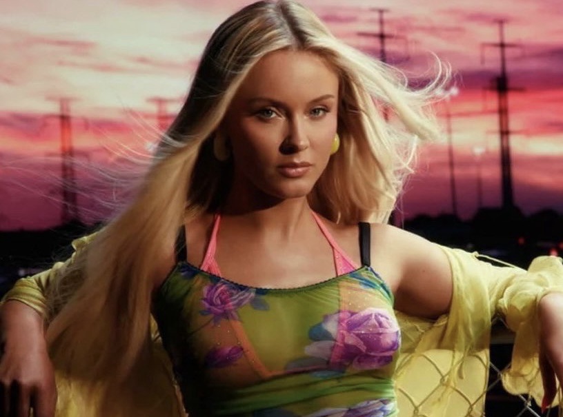 Zara Larsson changes her style and brand into a “Summer Princess” with vibrant colors and a nostalgic, Y2K style. She has risen in the charts with her new album ‘Midnight Sun’. Photo courtesy of whereisthebuzz.com